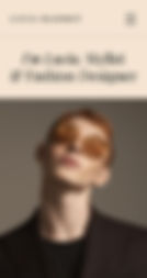 Mobile website of an online portfolio for ‘Lucia Maiget,’ a stylist and fashion designer, showing a redhead in glasses. 